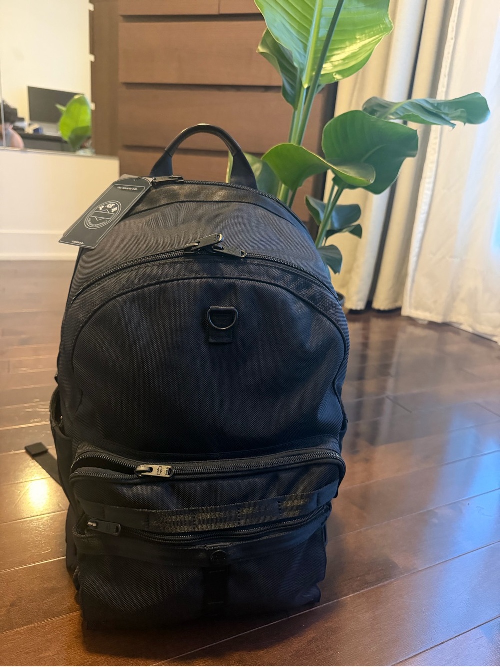 Classic Black Men's Backpack with Multiple Compartments